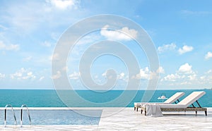 Luxury swimming pool terrace with sea view 3d render photo