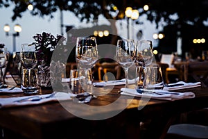 LUXURY TABLE SETTINGS 2019 for fine dining with and glassware, beautiful blurred background. For events, weddings. Preparation f