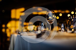 LUXURY TABLE SETTINGS 2019 for fine dining with and glassware, beautiful blurred background. For events, weddings. Preparation f