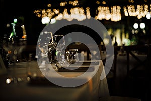 LUXURY TABLE SETTINGS 2019 for fine dining with and glassware, beautiful blurred background. For events, weddings. Preparation f