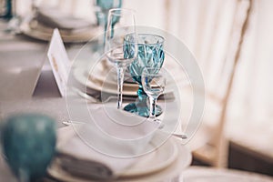 luxury tableware beautiful table setting in restaurant. The served table in the luxury restaurant. Beautiful evening restaurant