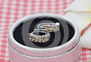 Luxury topaz earrings display in jewelry box