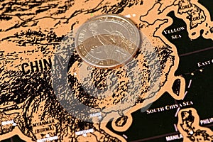 Luxury travel scratch map of blogger with one dollar coin photo