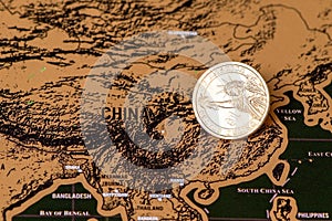 Luxury travel scratch map of blogger with one dollar coin photo