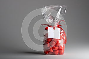 Luxury unhealthy gift of red candies with blank label