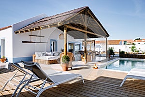 Luxury villa with chairs by the pool in Comporta, Portugal