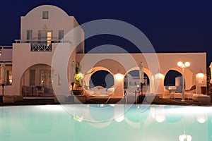 Luxury villa with private pool at night, Oia, Santorini
