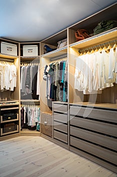 Luxury walk in closet / dressing room with lighting