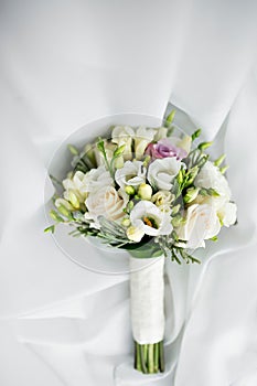 Luxury Wedding bouquet. The concept of marriage and love. accessories for just married ceremony close-up. Fresh flowers