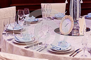 Luxury wedding reception. stylish numder one of tables and glass