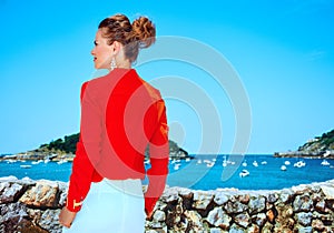 Traveller woman in Donostia Spain looking into the distance