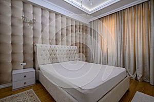 Luxury well designed modern beige master bedroom