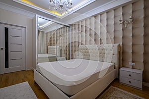 Luxury well designed modern beige master bedroom