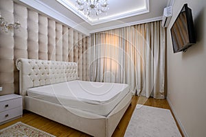 Luxury well designed modern beige master bedroom