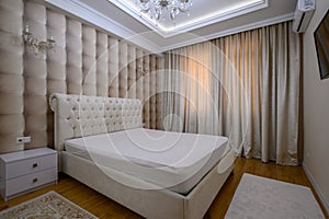 Luxury well designed modern beige master bedroom