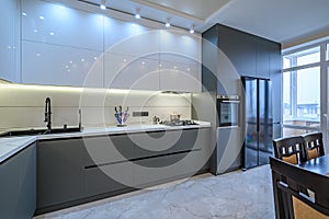 Luxury white and dark grey modern kitchen interior