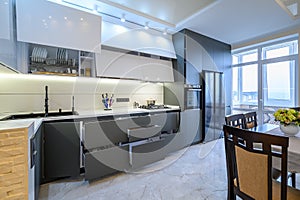 Luxury white and dark grey modern kitchen interior