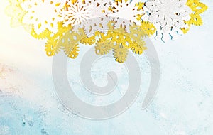 Luxury white and golden snowflakes on light blue background. Winter, Christmas, New year concept