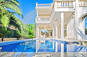 Luxury white house with swimming pool. Luxury villa in classica