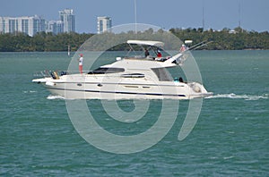 Luxury white Motor Yacht Cruising on Biscayne Bay
