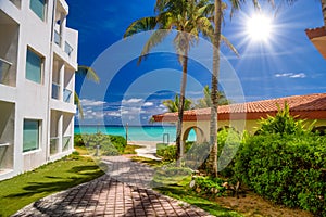 Luxury white villa with palms in Playa del Carmen, Yukatan, Mexico