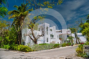 Luxury white villa with palms in Playa del Carmen, Yukatan, Mexico