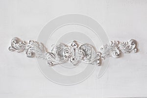 Luxury white wall design bas-relief with stucco mouldings roccoco element. Elements of torsel ornament for use as a