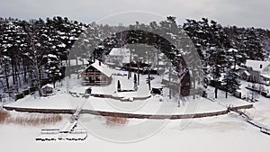 Luxury wooden building house cottage at winter aerial