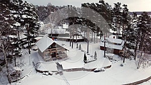 Luxury wooden building house cottage at winter aerial