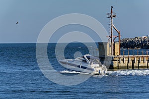 Luxury yacht leaving port of Tomis, Constanta.