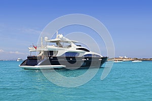 Luxury yacht in turquoise Illetes Formentera photo