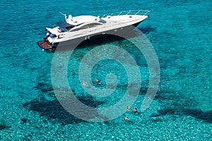 Luxury yacht in turquoise Illetes Formentera mediterranean sea B