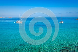 Luxury yacht in turquoise Illetes Formentera mediterranean sea B
