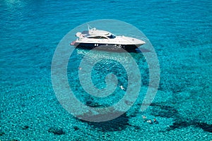 Luxury yacht in turquoise Illetes Formentera mediterranean sea B