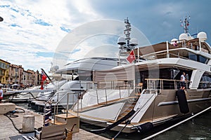 Luxury Yachts in the harbor of Saint Tropez - ST TROPEZ, FRANCE - JULY 13, 2020