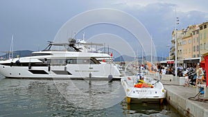 Luxury Yachts in the harbor of Saint Tropez - ST TROPEZ, FRANCE - JULY 13, 2020