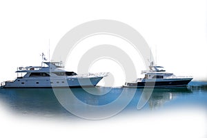 Luxury yachts isolated against white background