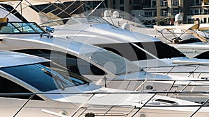 Luxury yachts moored on pier