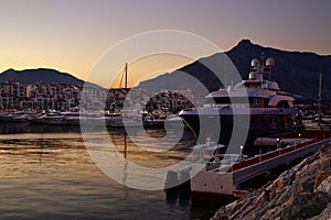 Luxury yachts and motor boats moored in Puerto Banus marina in Marbella, Spain