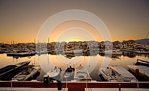 Luxury yachts and motor boats moored in Puerto Banus marina in Marbella, Spain photo