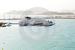 Luxury yachts near beach with a view on Jumeirah Palm