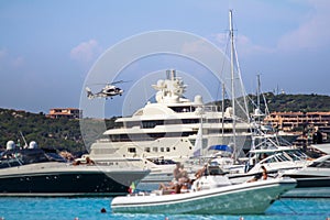 Luxury yachts at Porto Massimo bay at Sardinia Island, Italy