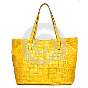 Luxury yellow leather female bag isolated on white