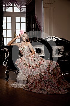 Luxury young smiling beautiful woman in vintage dress in elegant