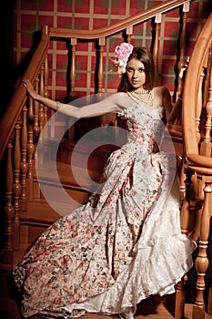 Luxury young smiling beautiful woman in vintage dress in elegant