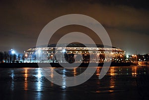 Luzhniki stadium on Luzhnetskaya embankment on a winter night. View from Sparrow hills. Winter night cityscape.