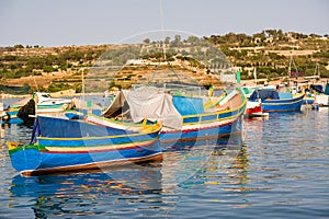 Luzzi, typical Maltese boats moored in the harbour