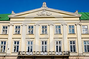 Lviv regional administration building with columns, windows and balcony on a sunny day