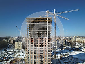 Lviv, Sychiv, Ukraine - 2 7 2020: Tower cranes work during the construction of a multi-story building. New apartments