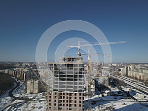 Lviv, Sychiv, Ukraine - 2 7 2020: Tower cranes work during the construction of a multi-story building. New apartments